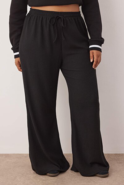 Trendyol Curve Black High Waist Wide Leg Draping Knitted Plus Size Pants Tbbaw26Ar00011