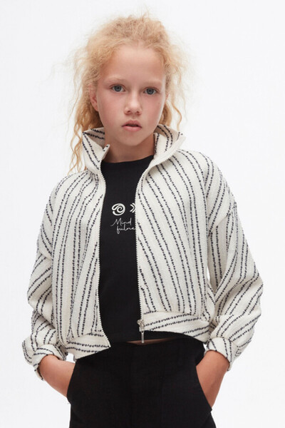 nk kids سترة بسحاب للفتيات باللون الكريمي والأسود 37328