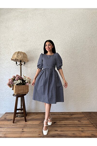 KÜÇÜĞÜM BUTİK Темно-синя сукня в горошок з кавуновим рукавом