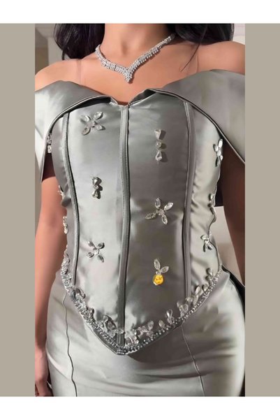 ILAN A luxurious off-the-shoulder Mikado fabric evening gown with a crystal-embroidered corset; an elegant and formal party dress.