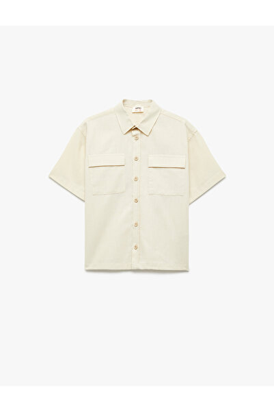 Koton Cămașă din bumbac cu mâneci scurte, cu nasturi și buzunare.