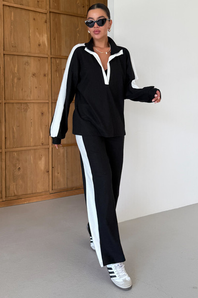 MODAGEN Dámský černý svetr s výstřihem do V a černým lemováním, kalhotový set