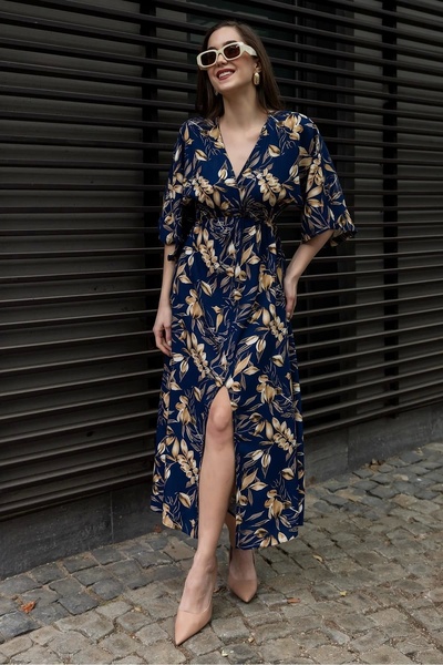 URİS فستان نسائي صيفي متوسط ​​الطول بياقة مزدوجة الصدر ومزين بنقشة زهور باللو...