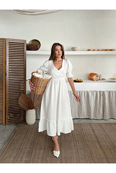 URİS فستان نسائي من قماش الموسلين البيج ذو ياقة على شكل حرف V وخصر مطاطي مطوي...