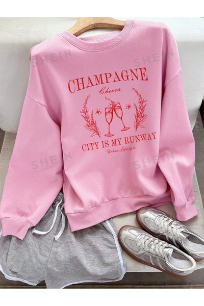 Vestiti Φούτερ με λαιμόκοψη με στάμπα σαμπάνιας