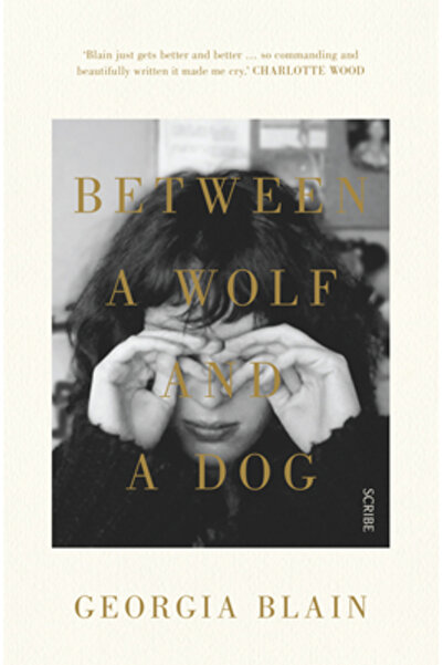 Scribe Pubn Between a Wolf and a Dog