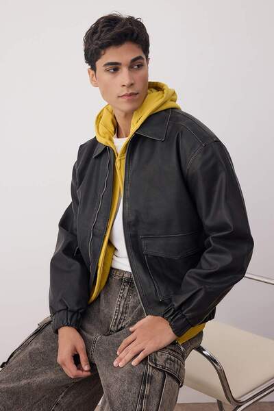 Trendyol Collection Чорна приталена куртка для чоловіків із 100% штучної шкіри TMNAW26MO00004