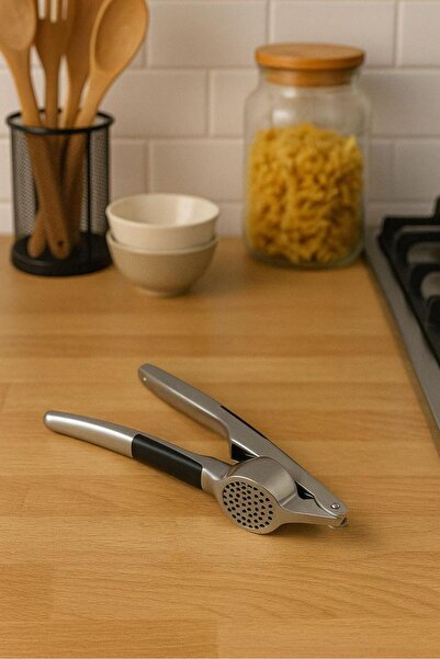 MOSTAFA هراسة ثوم يدوي ستيل