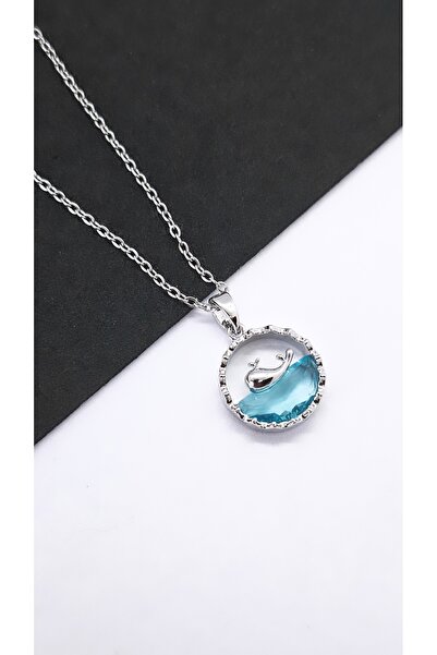 Serenity قلادة من الفولاذ مع شكل حوت عائم