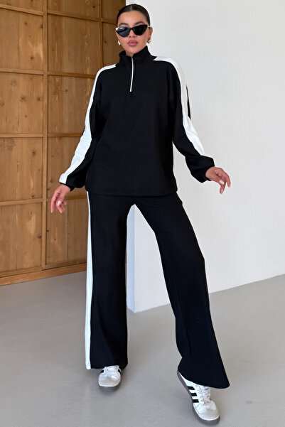 MODAGEN Dámský černý komplet s límečkem a polovičním zipem s detaily tlustého vzoru