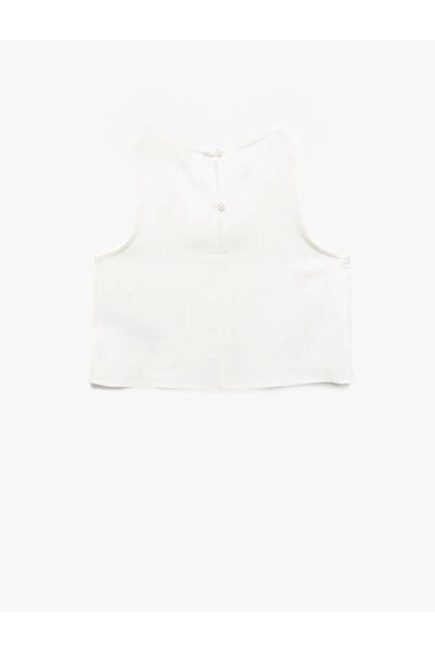 Koton Crew Neck Sleeveless Asymmetrical Cut Viscose Crop Blouse