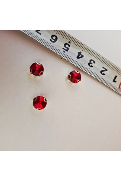 pegu baby collection حجر مرصع بقطع كريستال أحمر. العبوة تحتوي على 10 قطع.