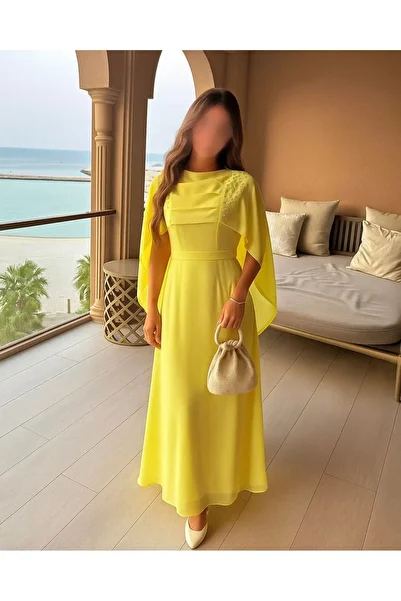 4YOU Soft yellow evening dress with cape sleeves and delicate embroidery