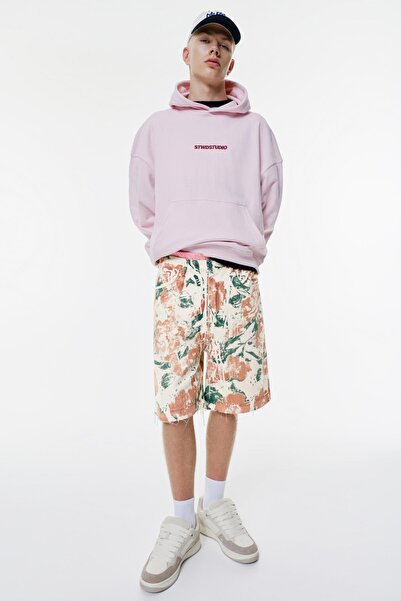 Pull & Bear Yırtmaçlı etek uçlu çiçekli bermuda