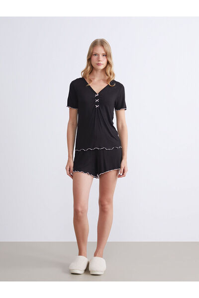LC Waikiki Alita City with a Difference of Lcw Dream Black Plain Short Sleeve...