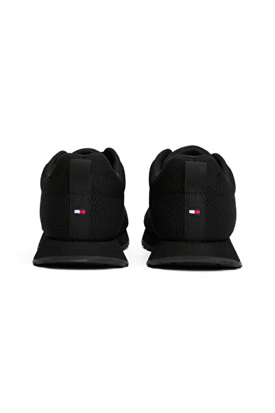 Tommy Hilfiger حذاء رياضي تومي هيلفيغر نيو رانر إيفا كوربو نيت منخفض الرقبة للرجال باللون الأسود