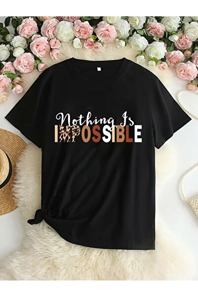 Flood Of Style حذاء نسائي أسود كبير الحجم مطبوع عليه كلمة "impossible"