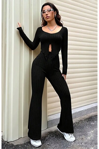 Wildco Set de pantaloni cu picioare largi spanioli, bluză din lycra cu mâneci lungi, cu decolteu rotund și cu deschidere în față pentru femei