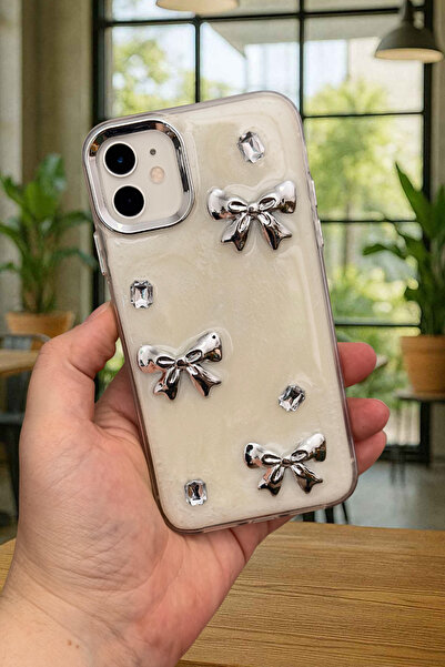 Vip Case iPhone 12 ve 12 Pro Uyumlu Epoksili 3D Figürlü Kalpli Kurdelalı Parl...