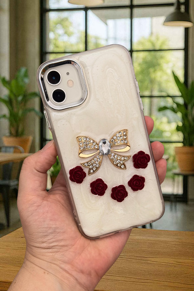 Vip Case iPhone 12 ve 12 Pro Uyumlu Epoksili 3D Figürlü Kalpli Kurdelalı Parl...