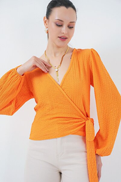 Hiccup Bdart Textured V-Neck Blouse with Pompom and Tie-Up Closure
