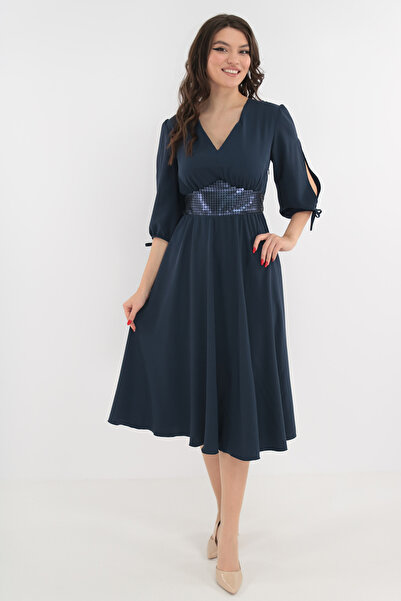 Vanessa Line RO Navy blue wrap dress with sequin insert at the waist