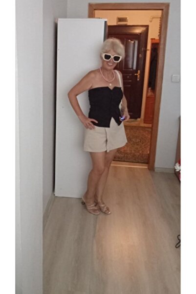 Butik Siyah önü çift kat, önden düğmeli, omuz arka kısmı lastikli rahat kalıp...