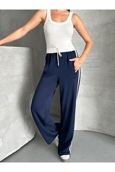 FERZOLAİO بنطلون رياضي باللون الأزرق الداكن مع تفاصيل مطاطية بيضاء في الخصر