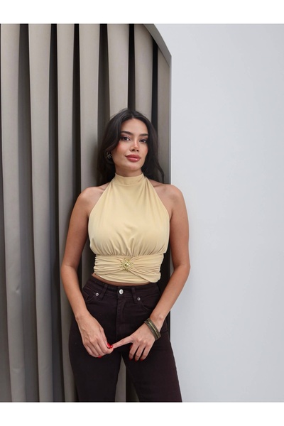 ESRAHELVACI Backless Blouse with Sun Accessories