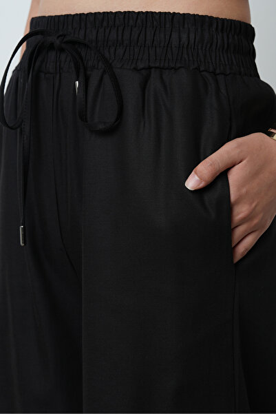 Orfeo Negro Women's Wide Leg Elastic Waist Solid Color Trousers