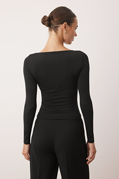 Trendyol Collection Μπλούζα μαύρη ελαστική πλεκτή με cut out λεπτομέρεια, εφαρμοστή, μακρυμάνικη TWOAW26BZ00130