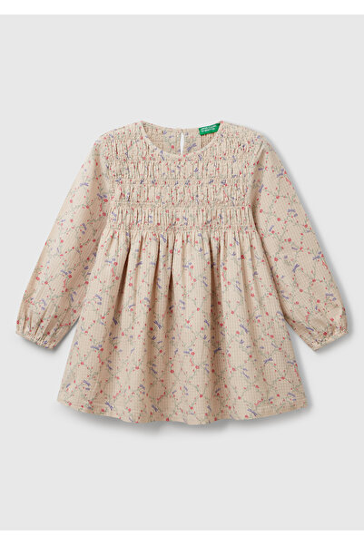 United Colors of Benetton Κοριτσίστικο εκρού ύφασμα Seersucker με λουλουδάτο μοτίβο ελαστικό πλισέ μακρυμάνικο φόρεμα