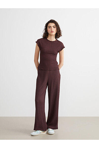 LC Waikiki Create Your Style from Uzg Store |   Textured Women's Trousers with Elastic Waist