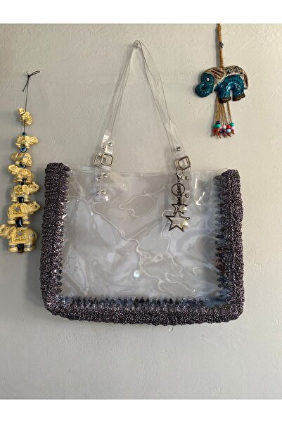Sibel EL ÖRGÜSÜ METALİK İP ŞEFFAF PLAJ ÇANTASI (AKSESUAR HEDİYELİ)