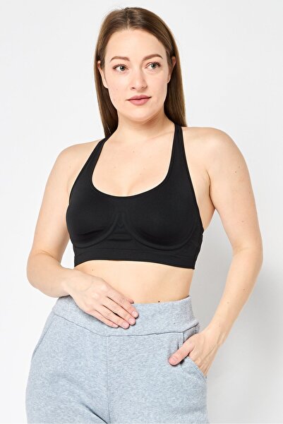 Calvin Klein حمالة صدر رياضية بدون أكمام مبطنة قليلاً للنساء، لون أسود