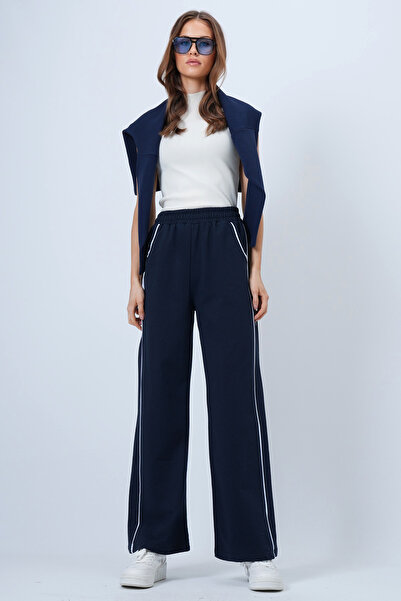 Trend Alaçatı Stili Marineblaue Damen-Jogginghose mit weitem Bein und Paspelierung, elastischer Bund, ALC-X14611