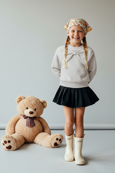 TRENDYOLKIDS سترة كار ميلانج القطنية ذات الرقبة الدائرية ذات الحجم الكبير المحبوكة للفتيات TKDAW26SW00022