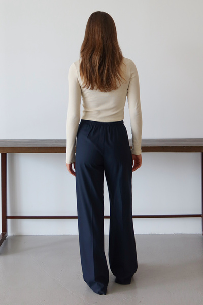 Trendyol Collection Námořnické modré žebrované široké kalhoty s dlouhým tkaným lemem TWOAW26PL00111