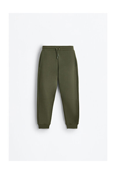 LEFTIES Dětské plyšové kalhoty s podpěrkou pro nohy