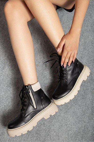 motto store حذاء نسائي أسود اللون بسحاب ونعل مسطح