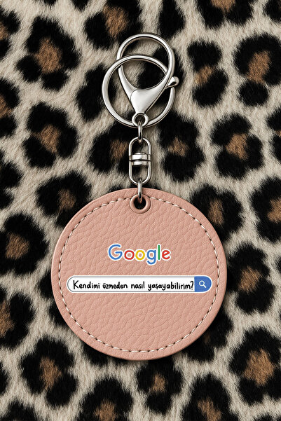 Cekuonline سلسلة مفاتيح جلدية قابلة للتجميع مع نقش مطبوع بتصميم مرح ولون وردي فاتح: دون أن أشعر بالحزن