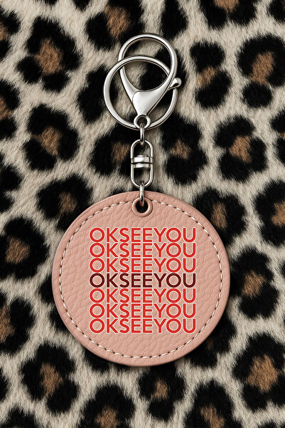 Cekuonline سلسلة مفاتيح جلدية قابلة للتجميع مع نقش مطبوع بتصميم مرح، لون وردي فاتح مع خطاف: أراك لاحقاً