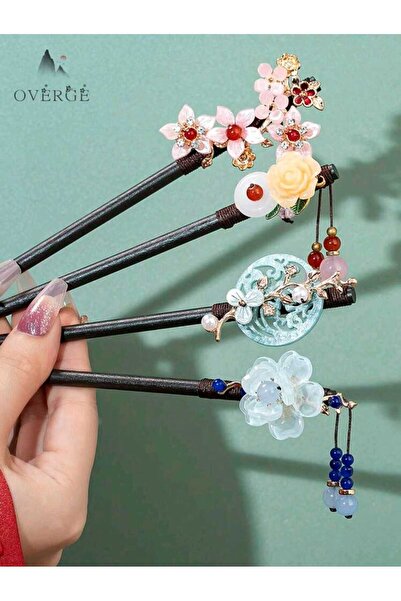 skycott سنرسل أيًا من مشابك الشعر الصينية على شكل كعكة كما هو موضح في الصورة