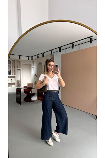 Sezgi Tekin Pantaloni din denim bleumarin, largi, din seria Premium