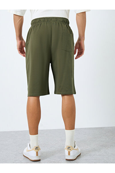 Styli Solid Oversized Shorts with Drawstring