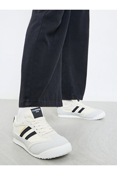 Styli حذاء رياضي نسائي مخطط بلون متباين