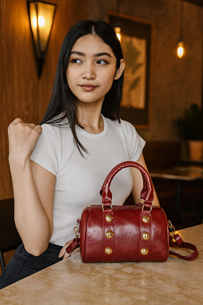 ESTUTE Розкішна золота циліндрична сумка через плече з деталями