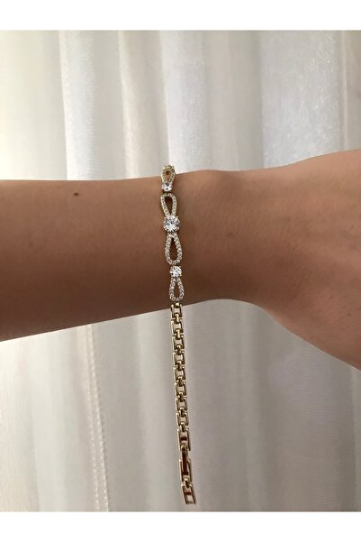 shop سوار من الفولاذ المقاوم للصدأ بلون ذهبي لامع مع أحجار صغيرة وحجر كبير متألق