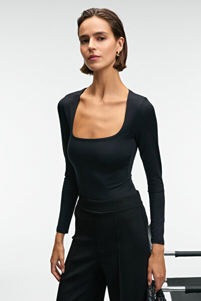 GRIMELANGE ZAFEEA Γυναικεία μπλούζα με λαιμόκοψη, ελαστικό ύφασμα και κουμπωτά κουμπώματα σε μαύρο χρώμα