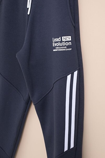 Cansın Mini Ανδρικό παντελόνι με λεπτομέρεια με ρίγες σε μπλε ναυτικό με ελαστική μέση 21461